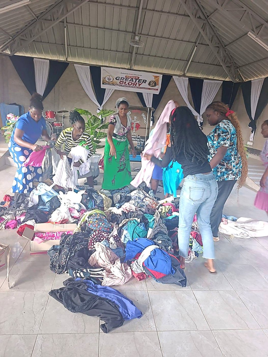 Sorting donated clothes at a GCIG clothing drive